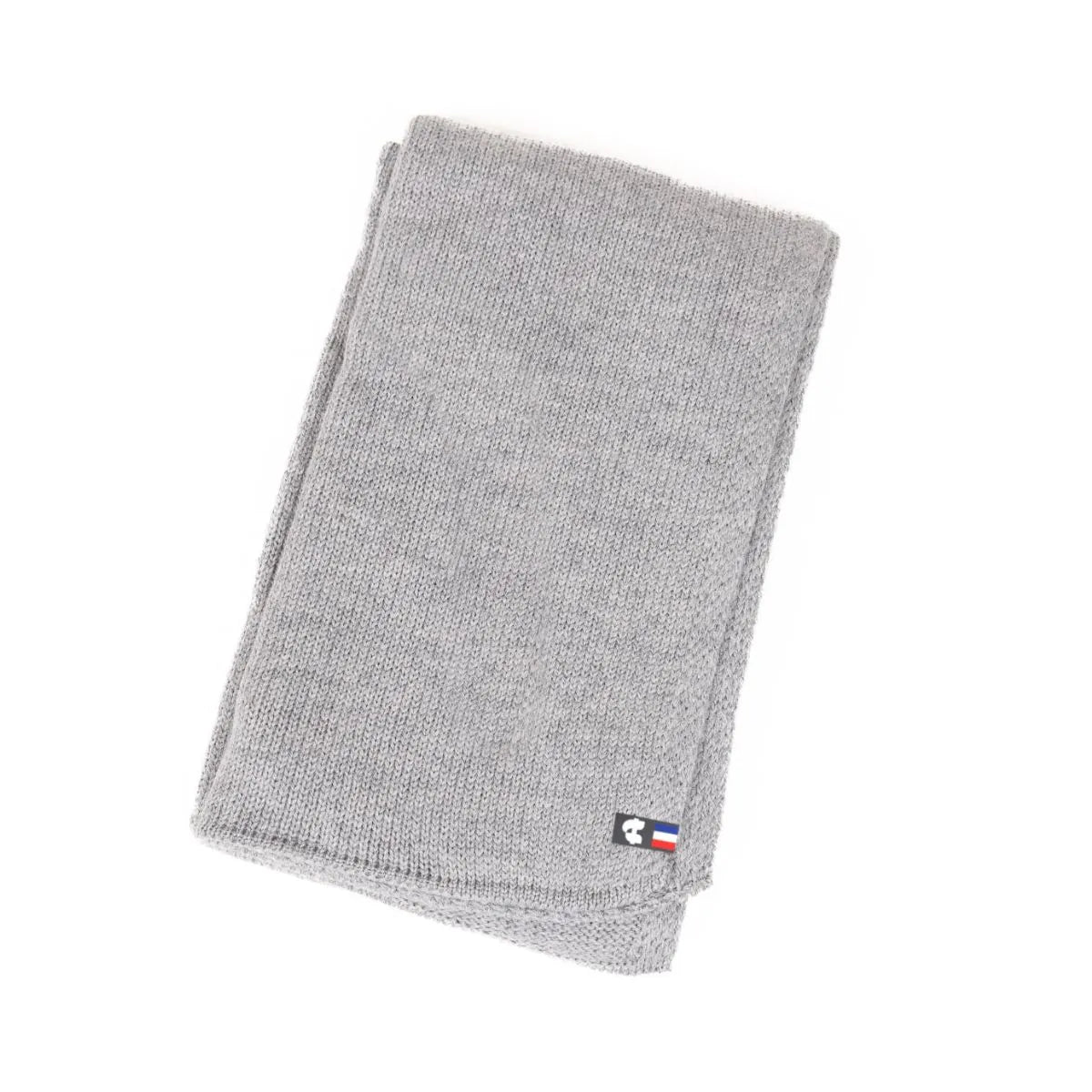 Écharpe en cachemire grise pour femme, pliée, avec son étiquette tricolore