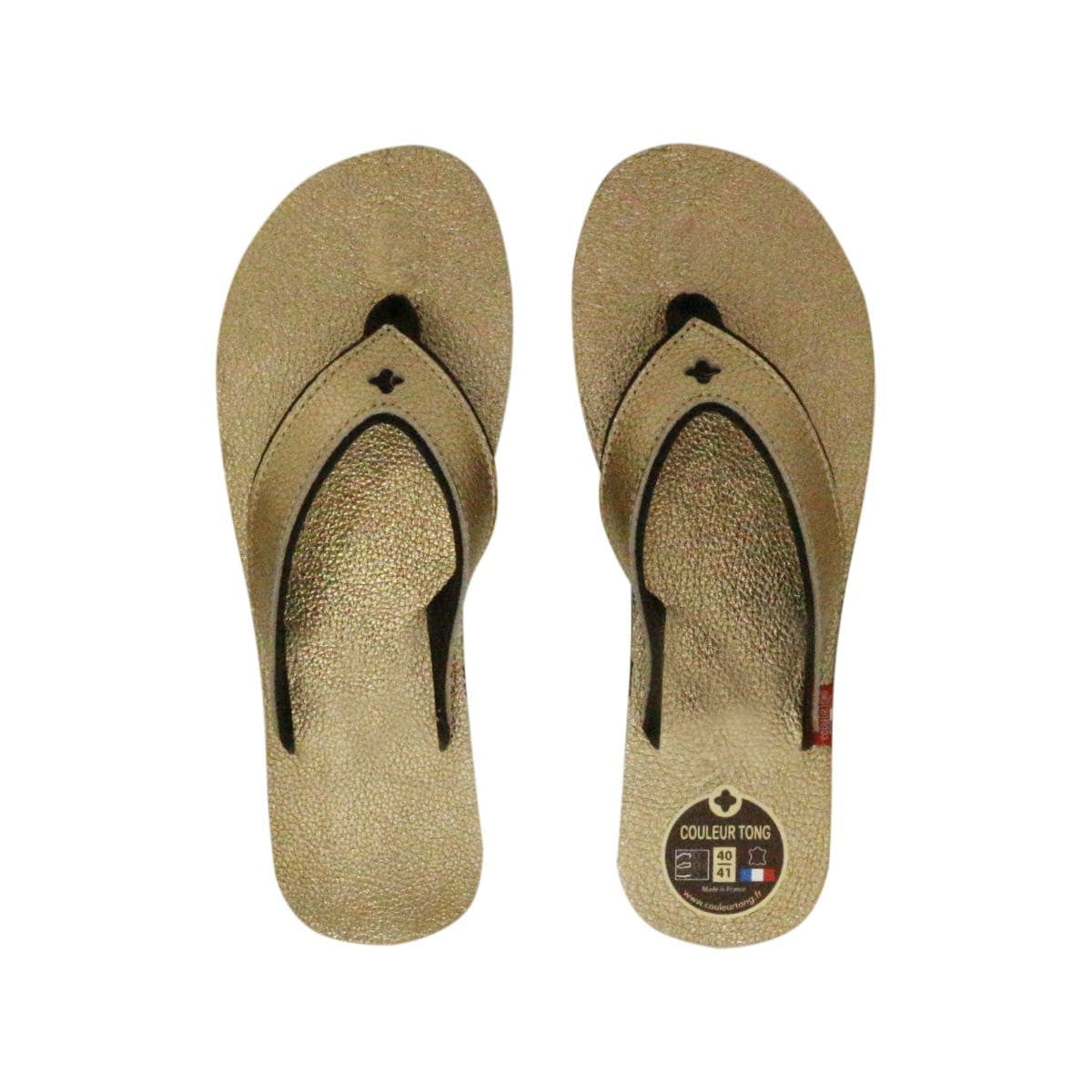 Tong en cuir or
